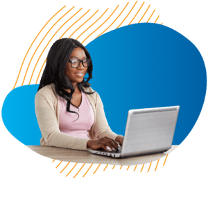 A smiling young black woman in business-casual attire, typing on a laptop and appreciating how easy Medrio eConsent is to use.