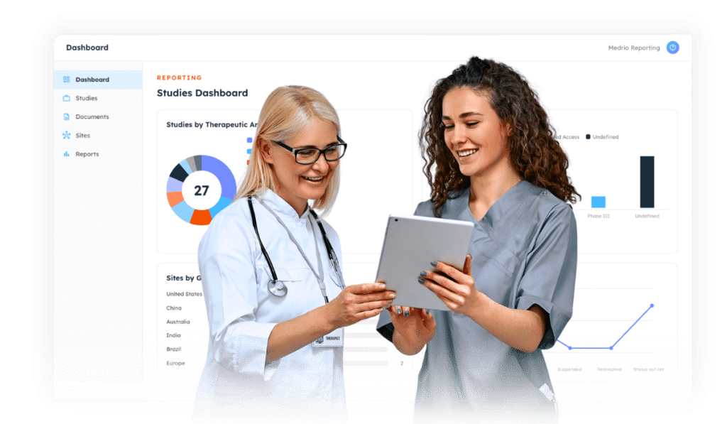 a female doctor and female nurse look at a tablet with Medrio CTMS platform screenshot in the background